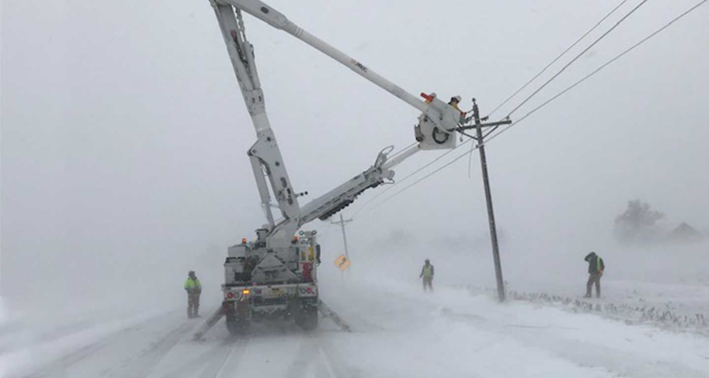Repairing broken pole, severe winter weather