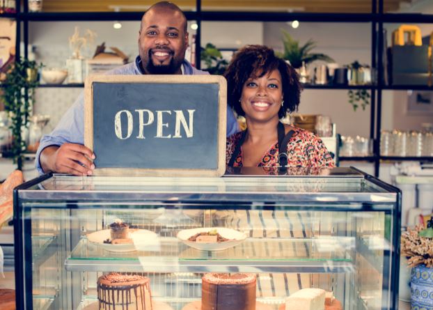 Business Couple Open Sign