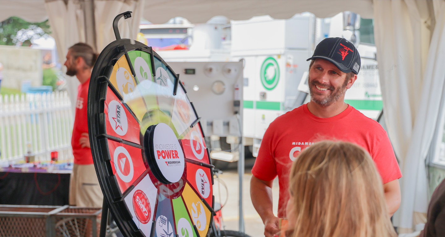 A MidAmerican CARES volunteer at the Iowa State Fair