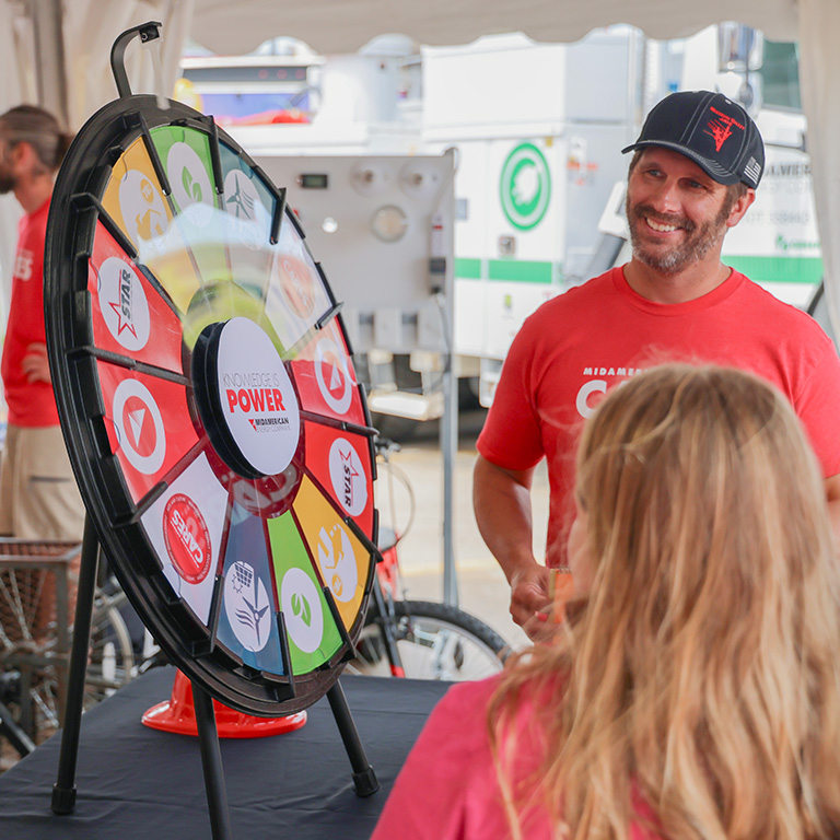 A MidAmerican CARES volunteer at the Iowa State Fair