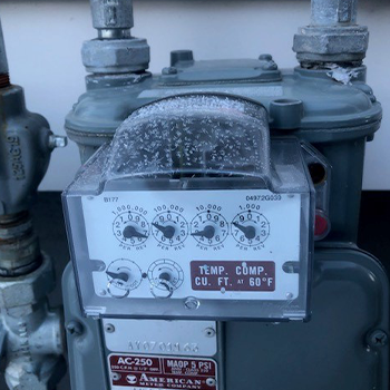 Gas meter with AMR device