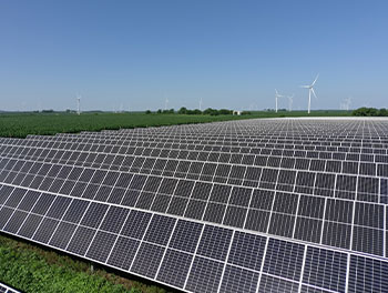 Solar panels with wind turbine