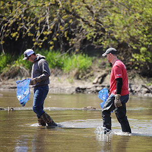 CARES clean the river event on earth day