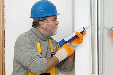man ceiling up a window