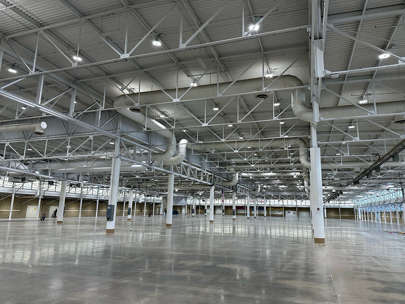 The Iowa State Fair's Varied Industries building with a focus on ceiling light fixtures after LED upgrades