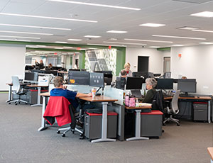 MidAmerican employees working at a desk