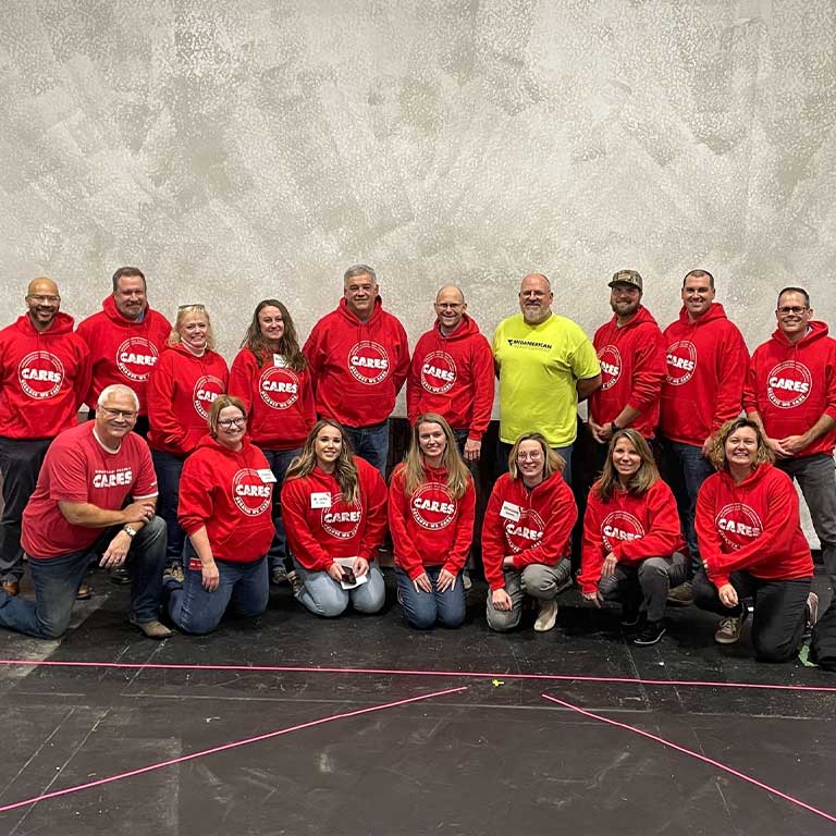 Group of people at the playhouse, CARES volunteer event