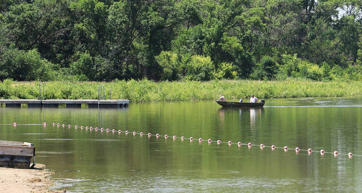 Boaters enjoying Brown's Lake, which was recently restored with help from MidAmerican Energy