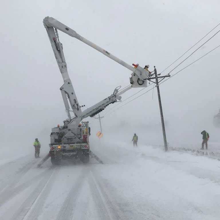 Crew makes repairs during winter storm