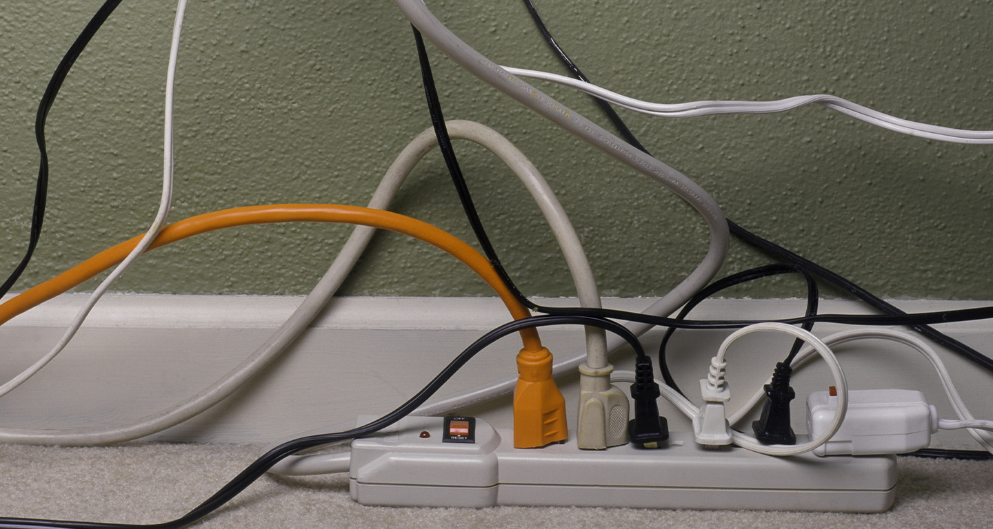 extension cords plugged into one device