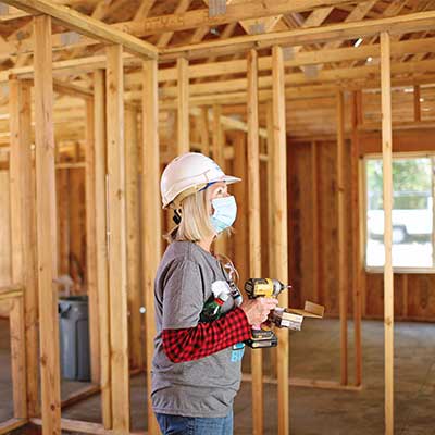 Women Volunteer building a house for Habitat for Humanity