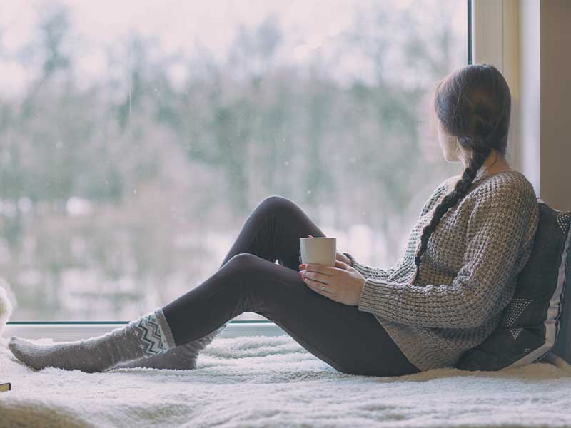 Coffee by the window in winter
