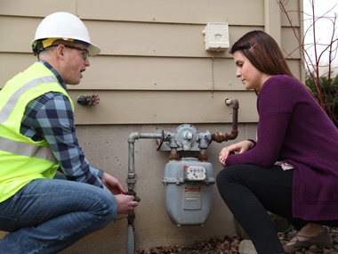 MEC Employee and Customer with Gas Meter